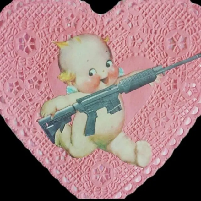 light show cover art: a kewpie doll holding an assault rifle on a pink paper doily heart