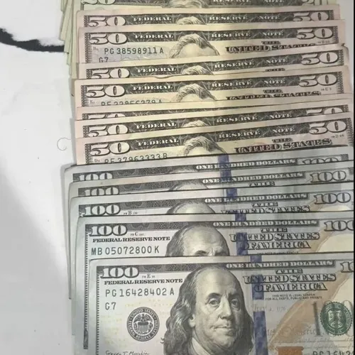 100s cover art: a fanned stack of $100 and $50 bills